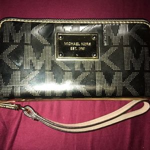 Michael Kors gold metallic wristlet